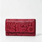 Cartera con relieve floral