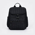 Elegante bolso cambiador con múltiples bolsillos