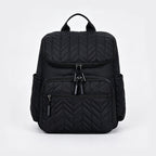 Elegante bolso cambiador con múltiples bolsillos