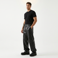 Pantalones de cuero de pierna ancha con estampado de cocodrilo