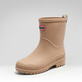 Modern mid-calf rain boots