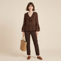 Camisa elegante con volantes