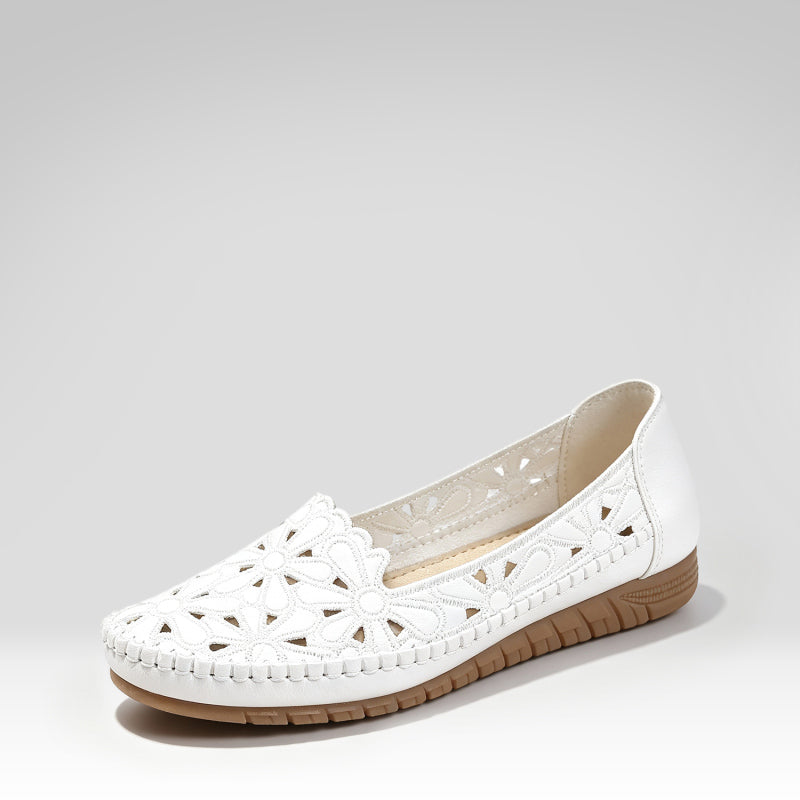 Casual shoes with elegant laser-cut details.