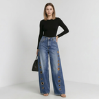 Vaqueros de mezclilla metalizada a la moda