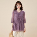 Elegante blusa morada