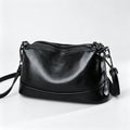Bolso bandolera de piel de vacuno de color liso
